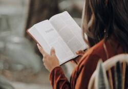 image of woman and Bible