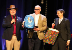 Image: Gafcon's Secretary General Paul Donison (left) farewelled with a Bluey backpack and Akubra by Peter Smith and Jen Hercott.