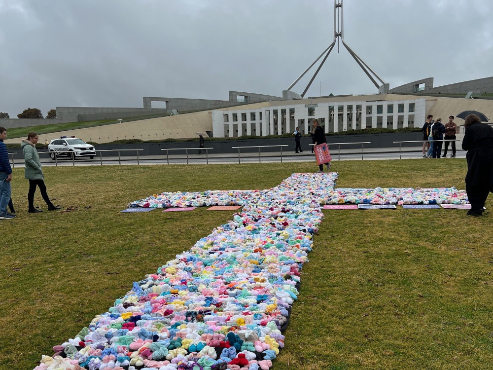 ACL baby booties abortion demo